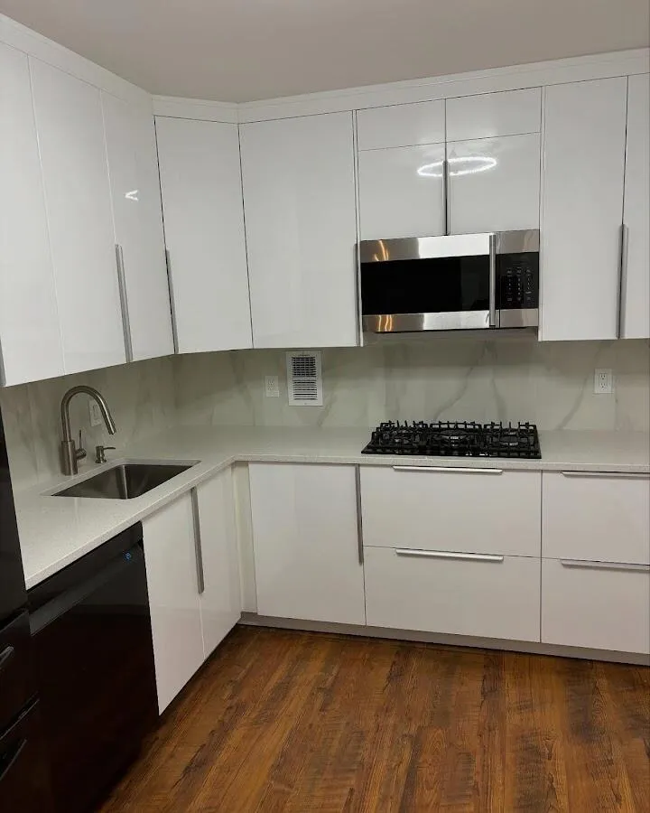 Restored kitchen with white cabinets after water damage in Lima